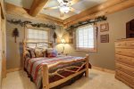 Antler Lodge - Master bedroom with King log bed. 
